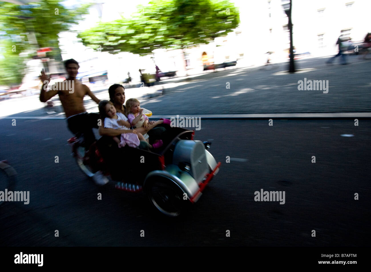 a cycle-cab with young family on the Spui in amsterdam holland Stock Photo