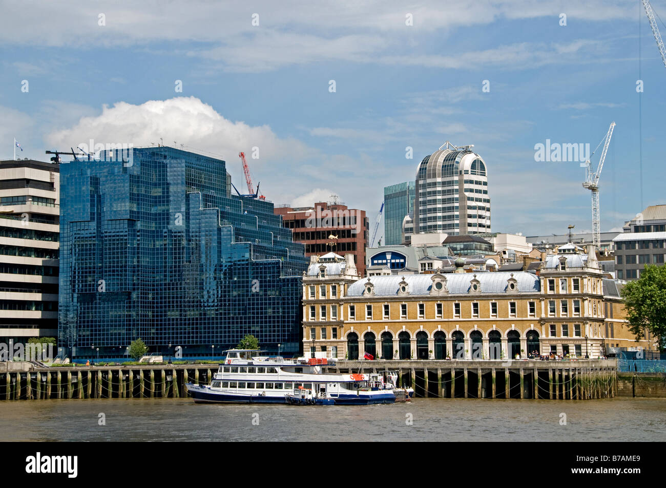Skyline Gherkin financial bank commercial centre district riverfront river Thames Mary Axe Swiss Re tower of London skyline Stock Photo