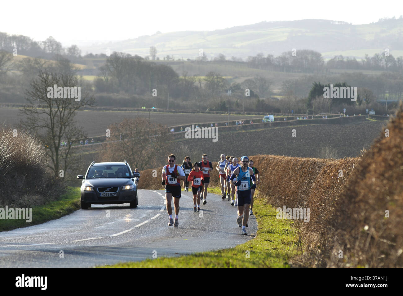 Car overtaking runner hires stock photography and images Alamy