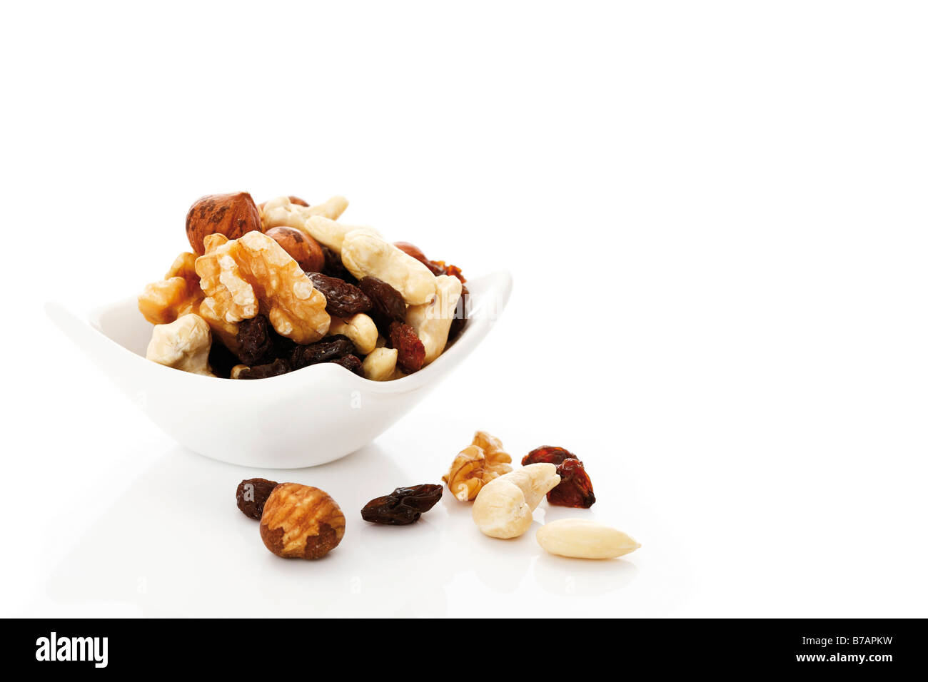 Trail mix, nuts and raisins Stock Photo
