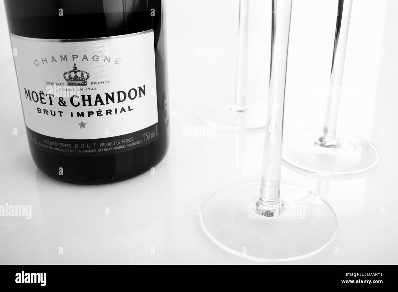A bottle of Moet et Chandon champagne and some champagne glasses Stock Photo