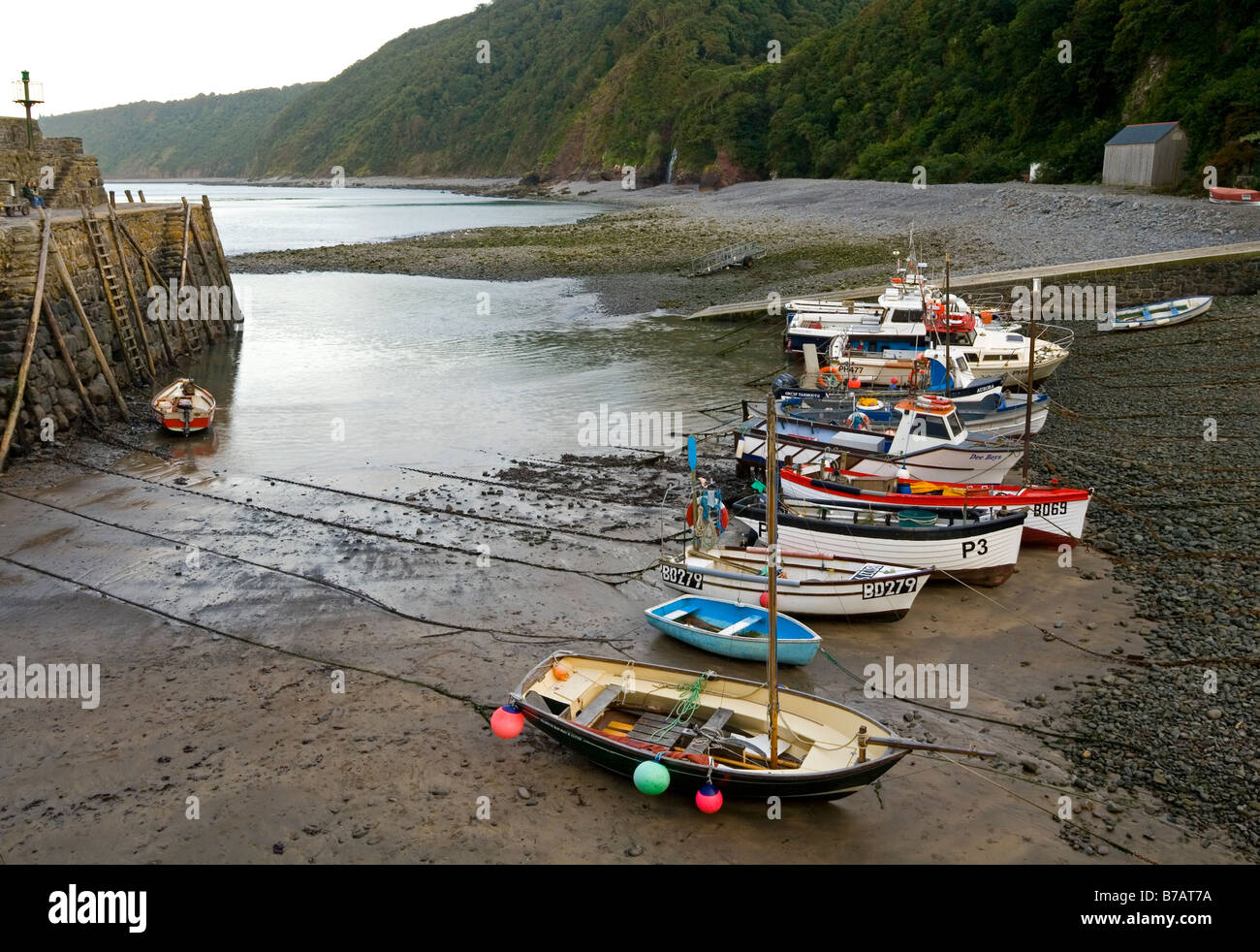 Fishing boats on the beach at Clovelly near Bideford in North Devon England UK Stock Photo