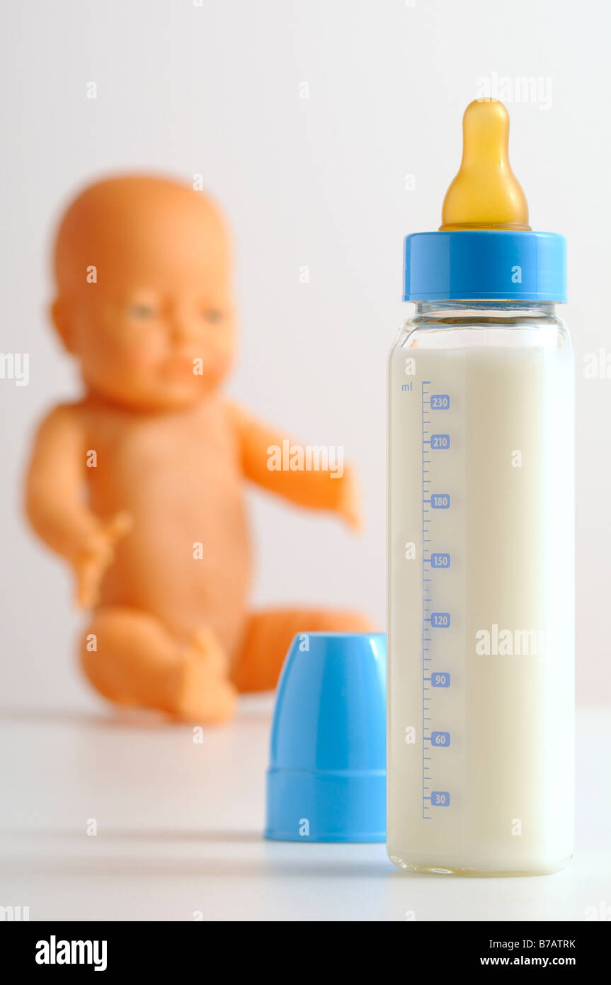 Baby Doll and Baby Bottle Stock Photo Alamy
