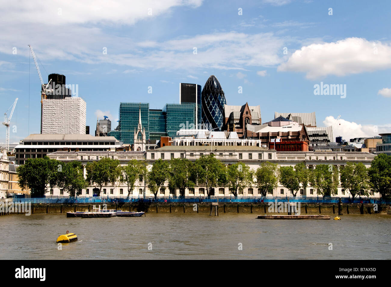 Skyline Gherkin financial bank commercial centre district riverfront river Thames Mary Axe Swiss Re tower of London skyline Stock Photo
