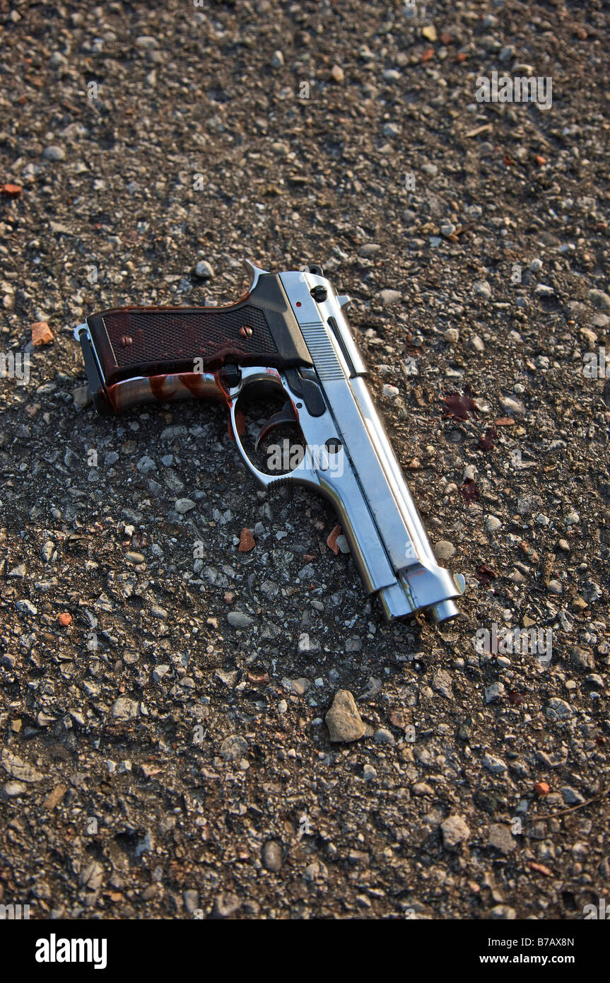 Close-up of Bloodied Gun Stock Photo - Alamy
