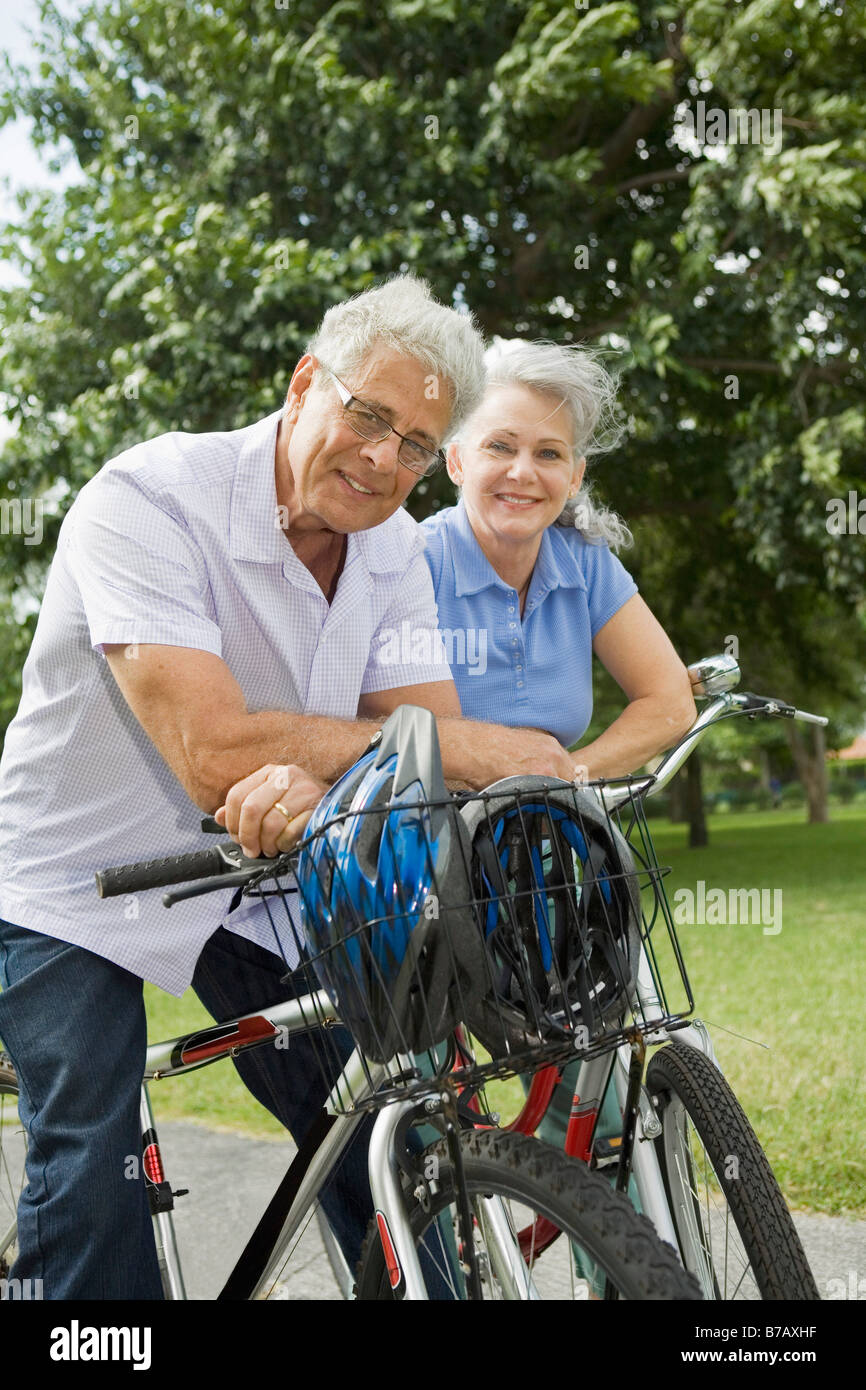 BabyBoomer Couple Riding Bikes Stock Photo Alamy