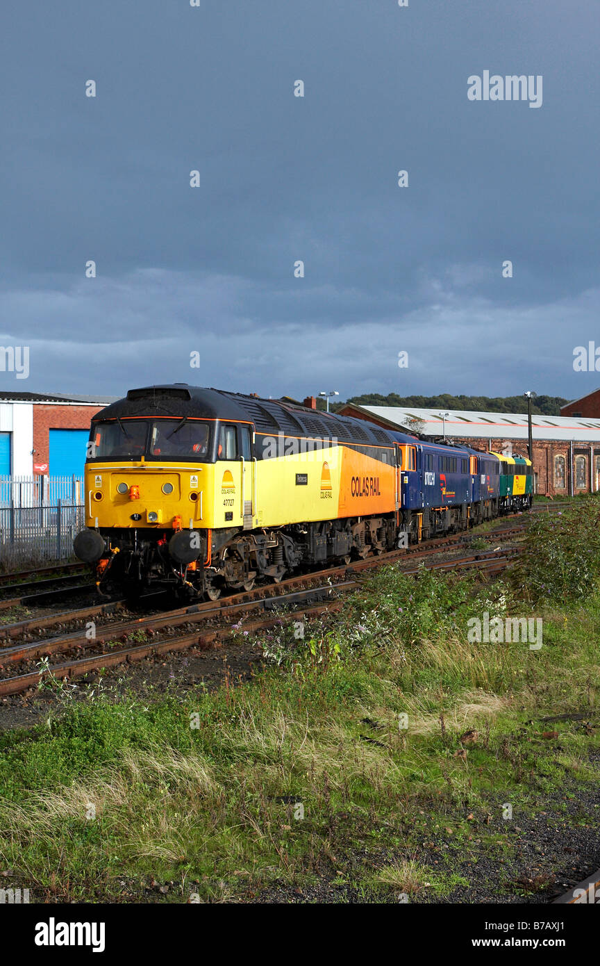 47727 Rebecca is seen recessing in Worcester yard with 87022 87028 87010 in tow for export to Bulgaria Stock Photo