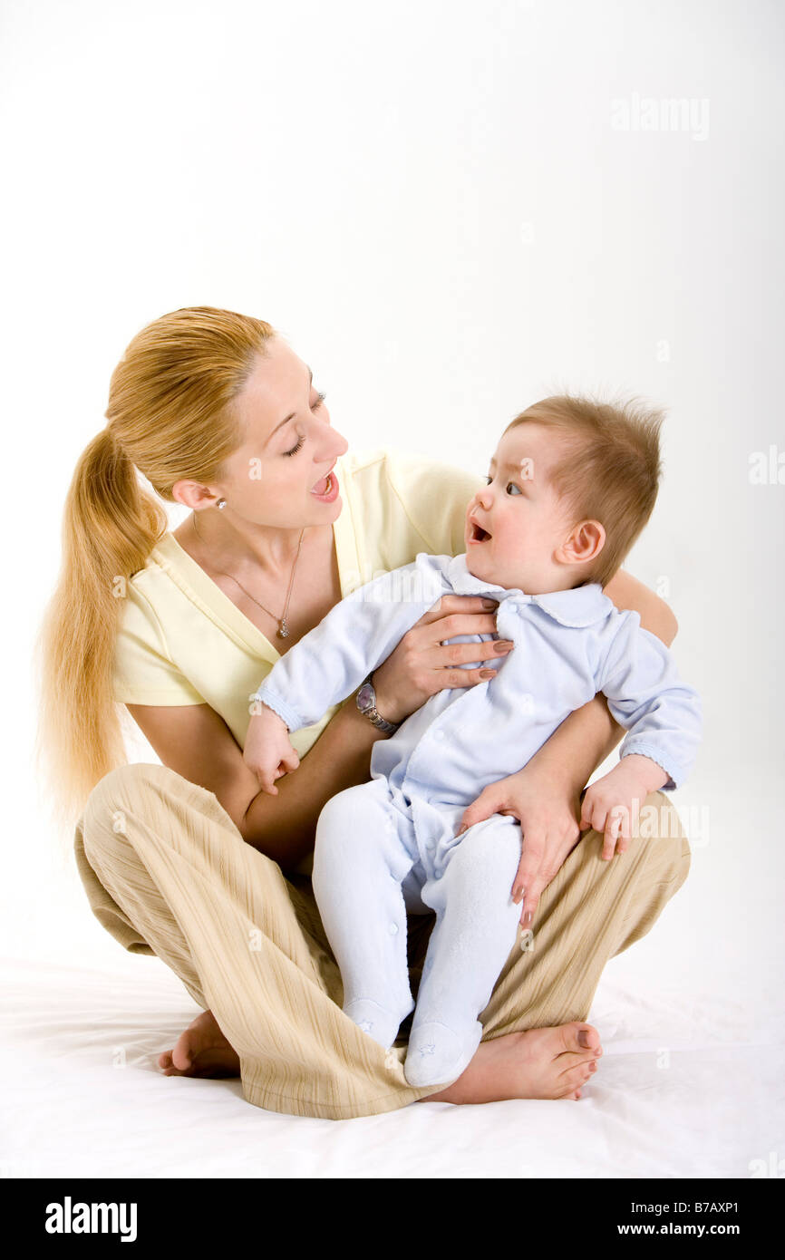 Mother caring baby boy portait Stock Photo