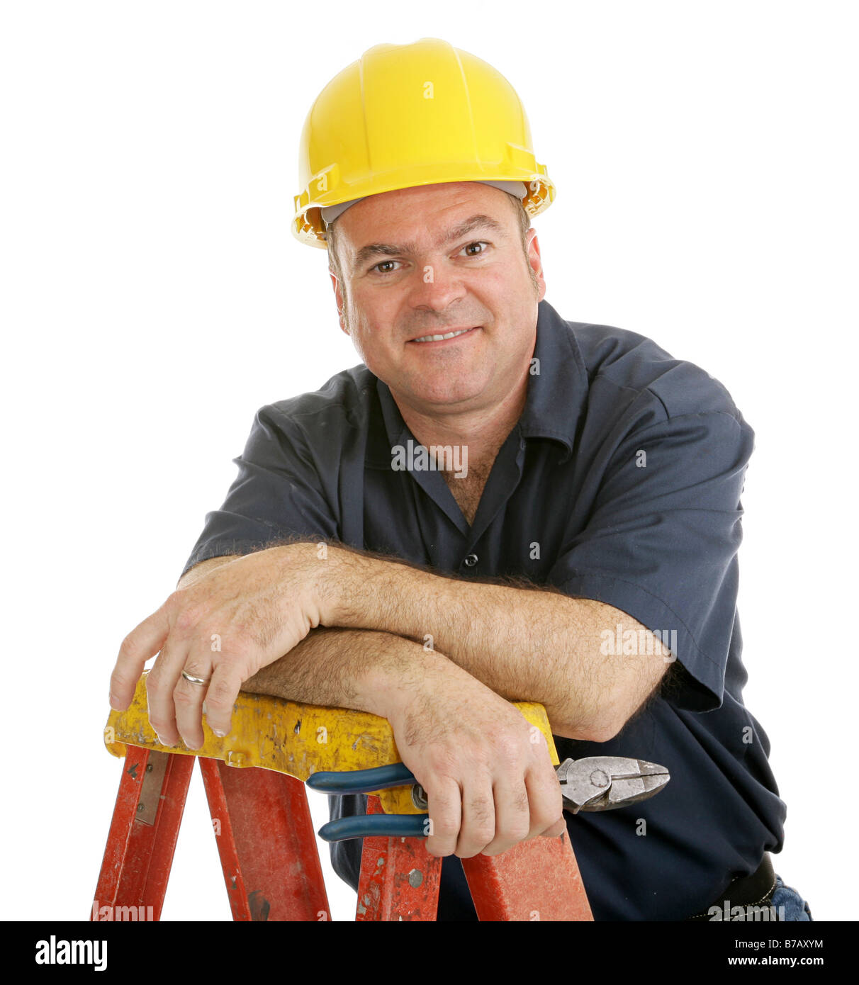 Friendly typical construction worker on top of a ladder holding a pliers Isolated on white Stock Photo