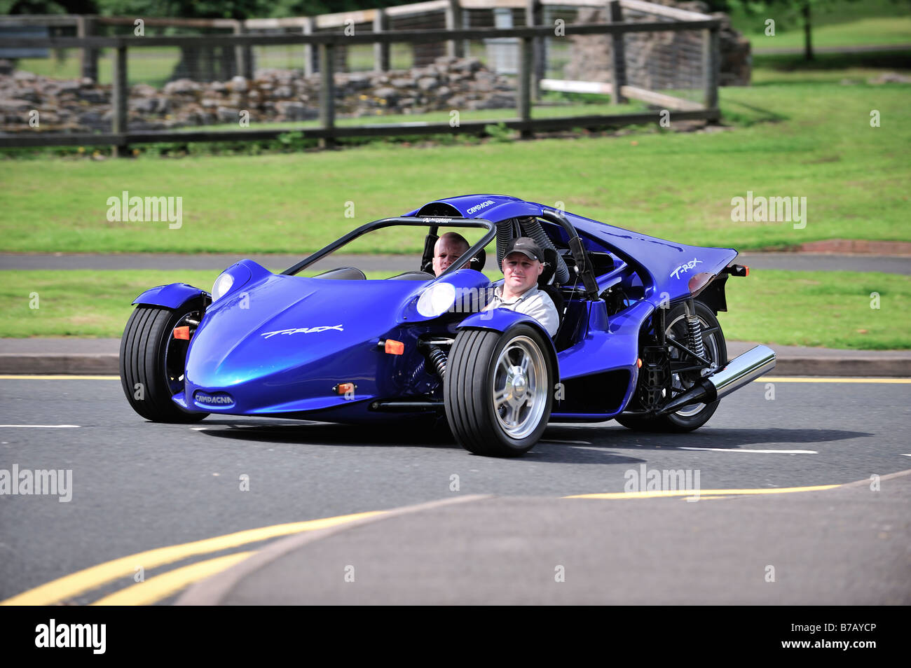 Driving a Blue T Rex sports trike Stock Photo - Alamy