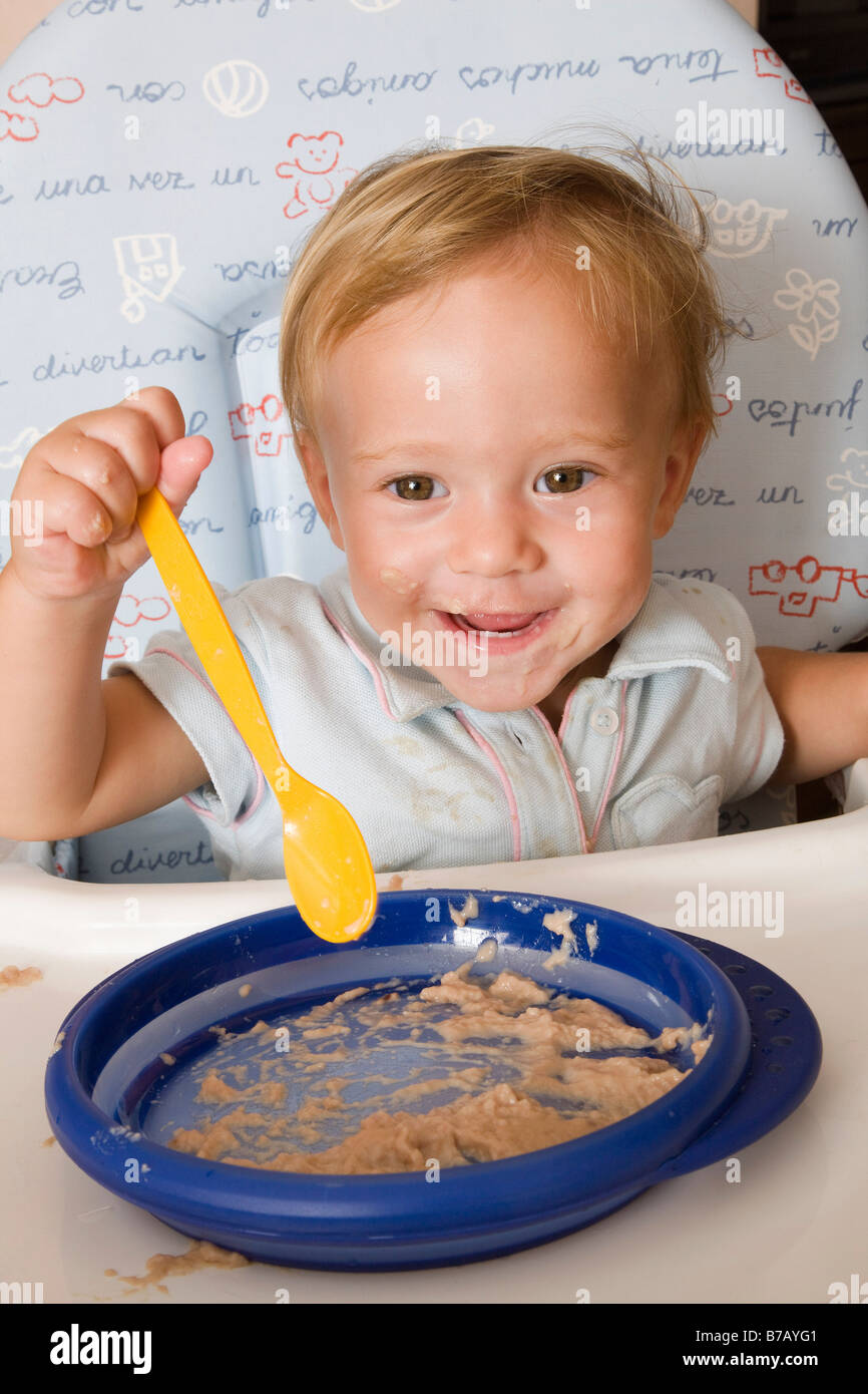 Portrait of Little Boy Eating Stock Photo