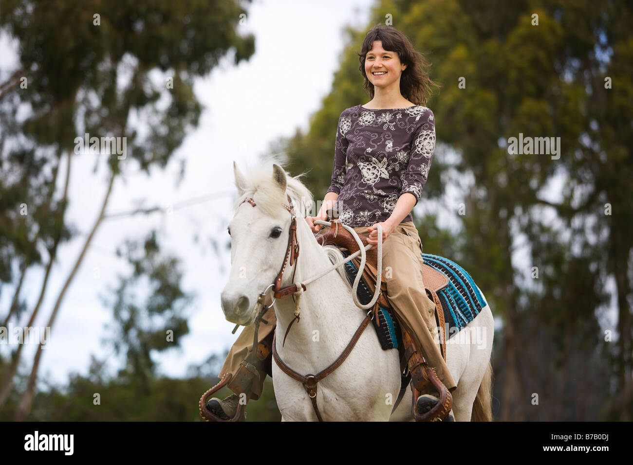 Woman Horseback Riding on Ranch, Santa Cruz, California, USA Stock Photo