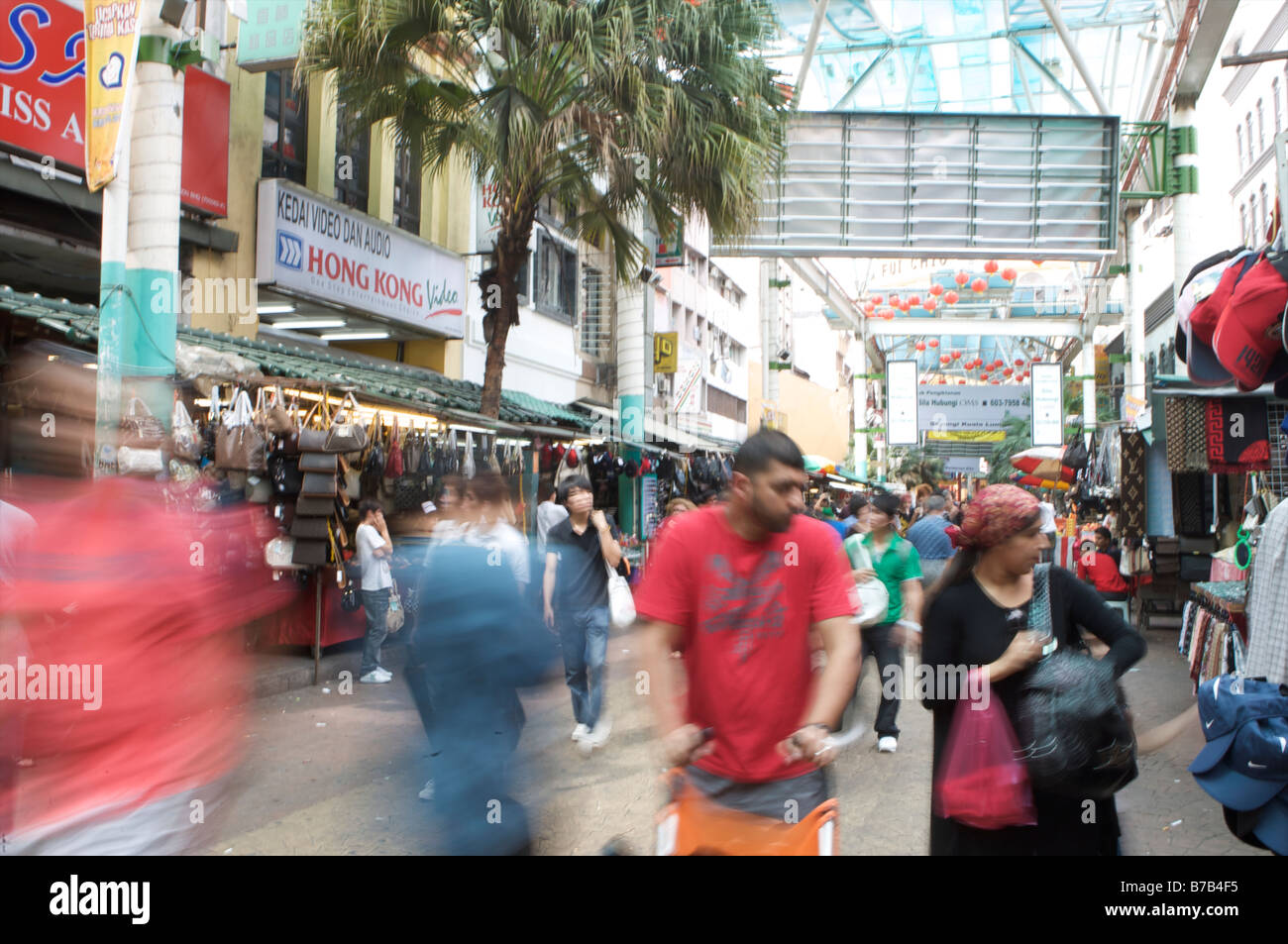 fake designer pirate pirated luxury goods on sale stall petaling street  chinatown kuala lumpur malaysia louis vuitton bags Stock Photo - Alamy