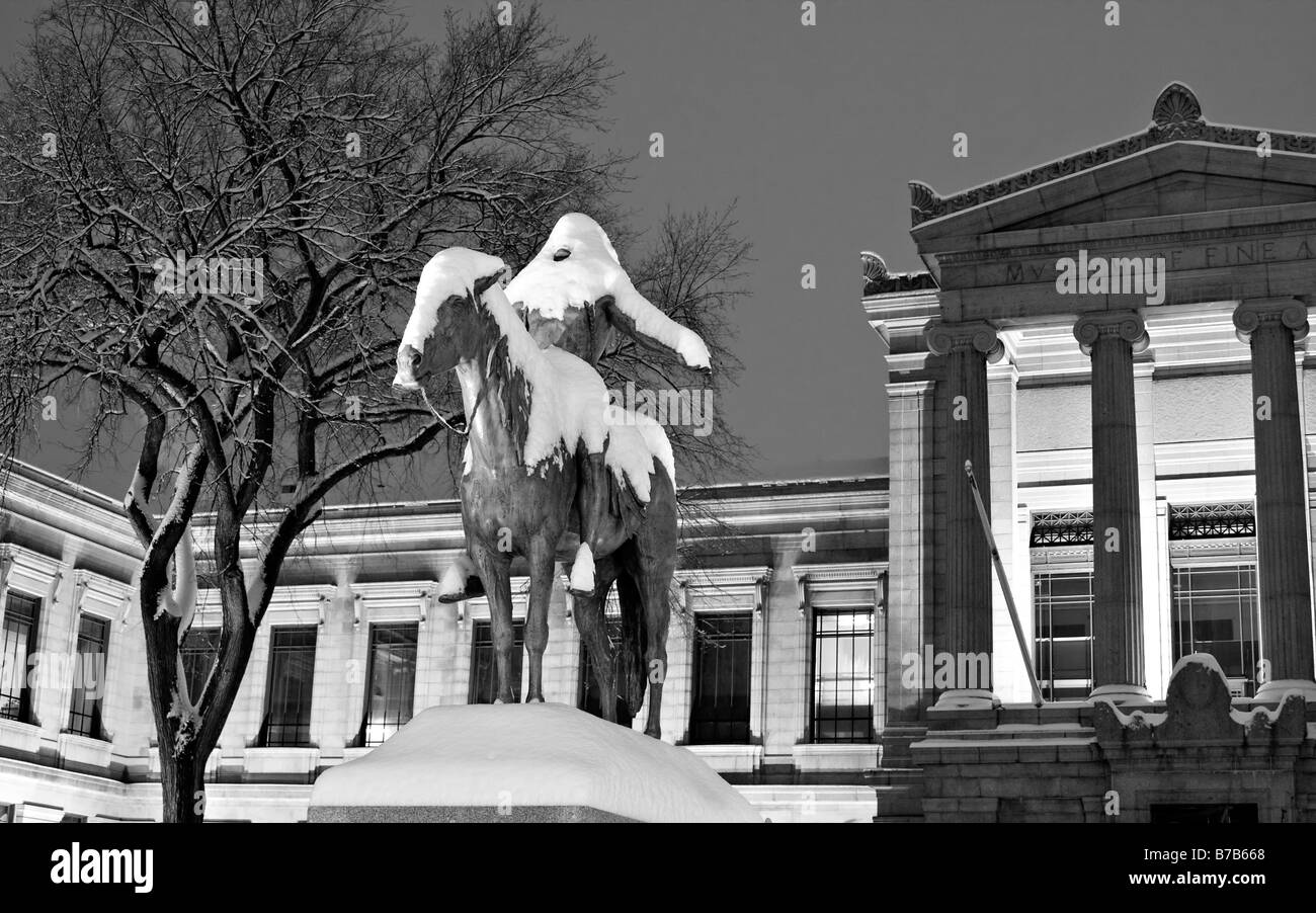 Snow covered sculpture 'Appeal to the Great Spirit' by Cyrus Dallin,  Museum of Fine Arts in Boston, Massachusetts. Stock Photo