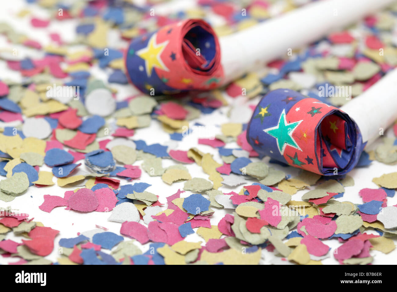 detail blowers on confetti background party and celebration Stock Photo