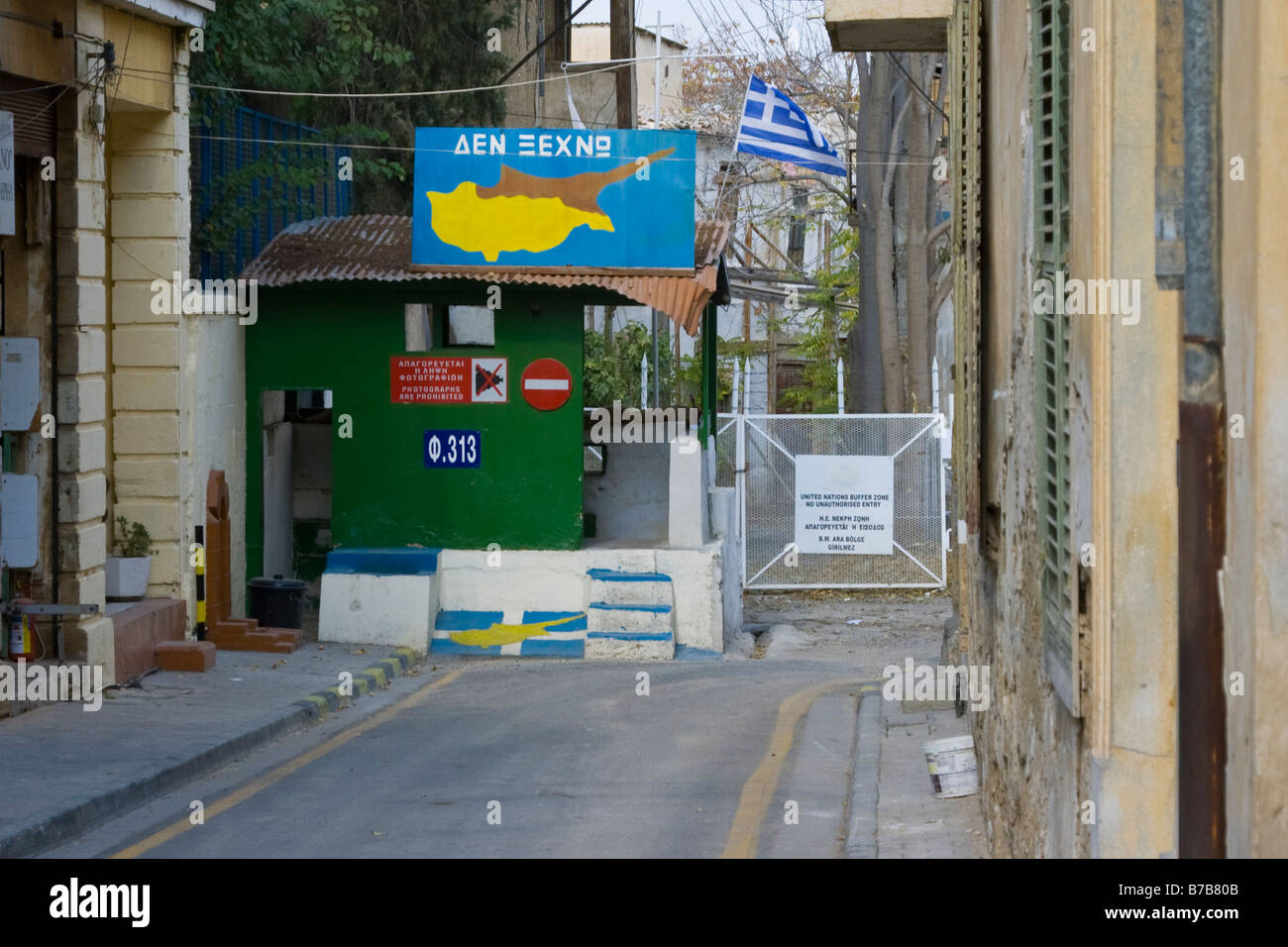 Greek Flag at Republic of Cyprus Post on the Green Line in Nicosia Separating North and South Cyprus Stock Photo