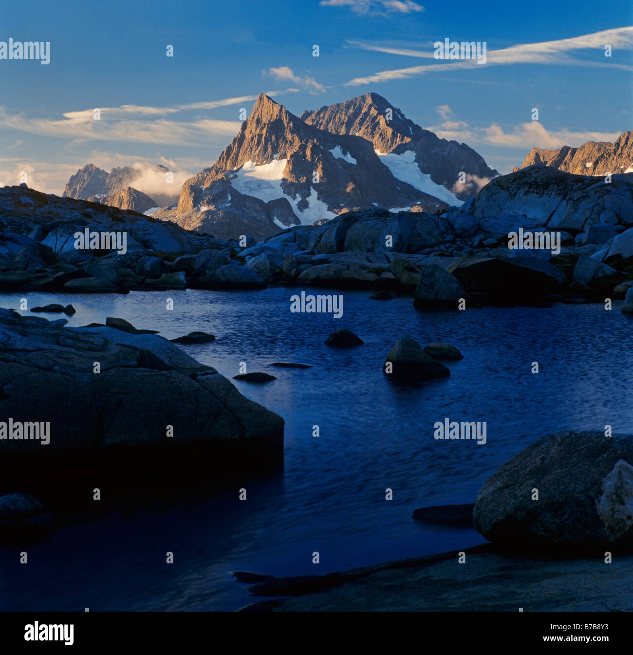 A view of one of the LOST LAKES in the ANSEL ADAMS WILDERNESS with a SIERRA PEAK CALIFORNIA Stock Photo