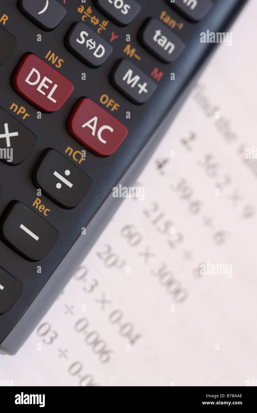 Math Maths calculator with school college mathematics text study book Stock  Photo - Alamy