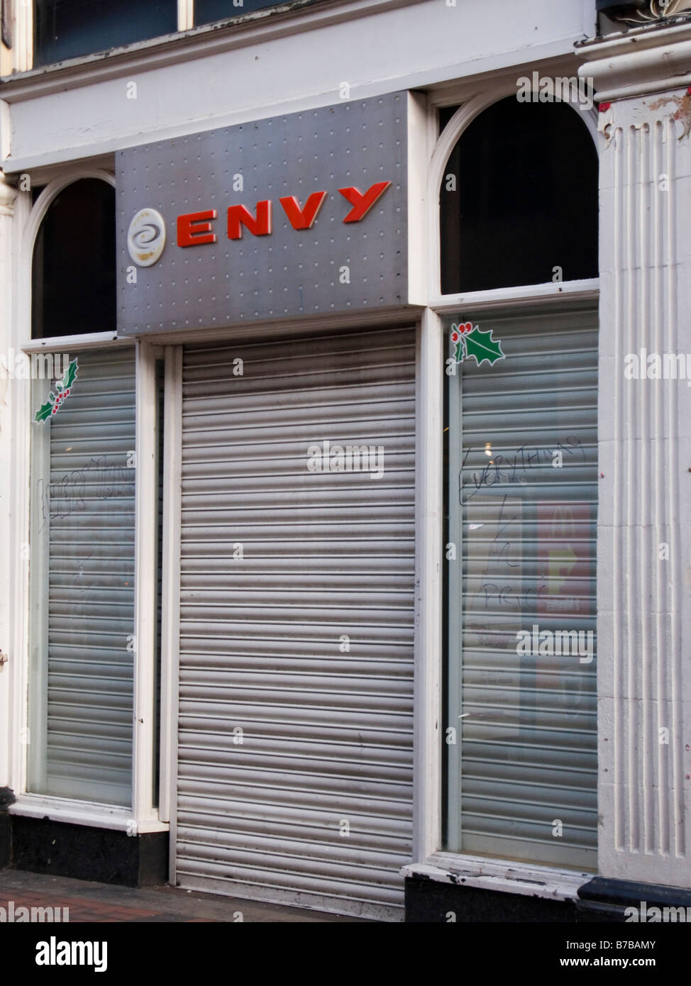 Closed down shuttered Envy High Street store in Regent Street, Swindon UK Stock Photo