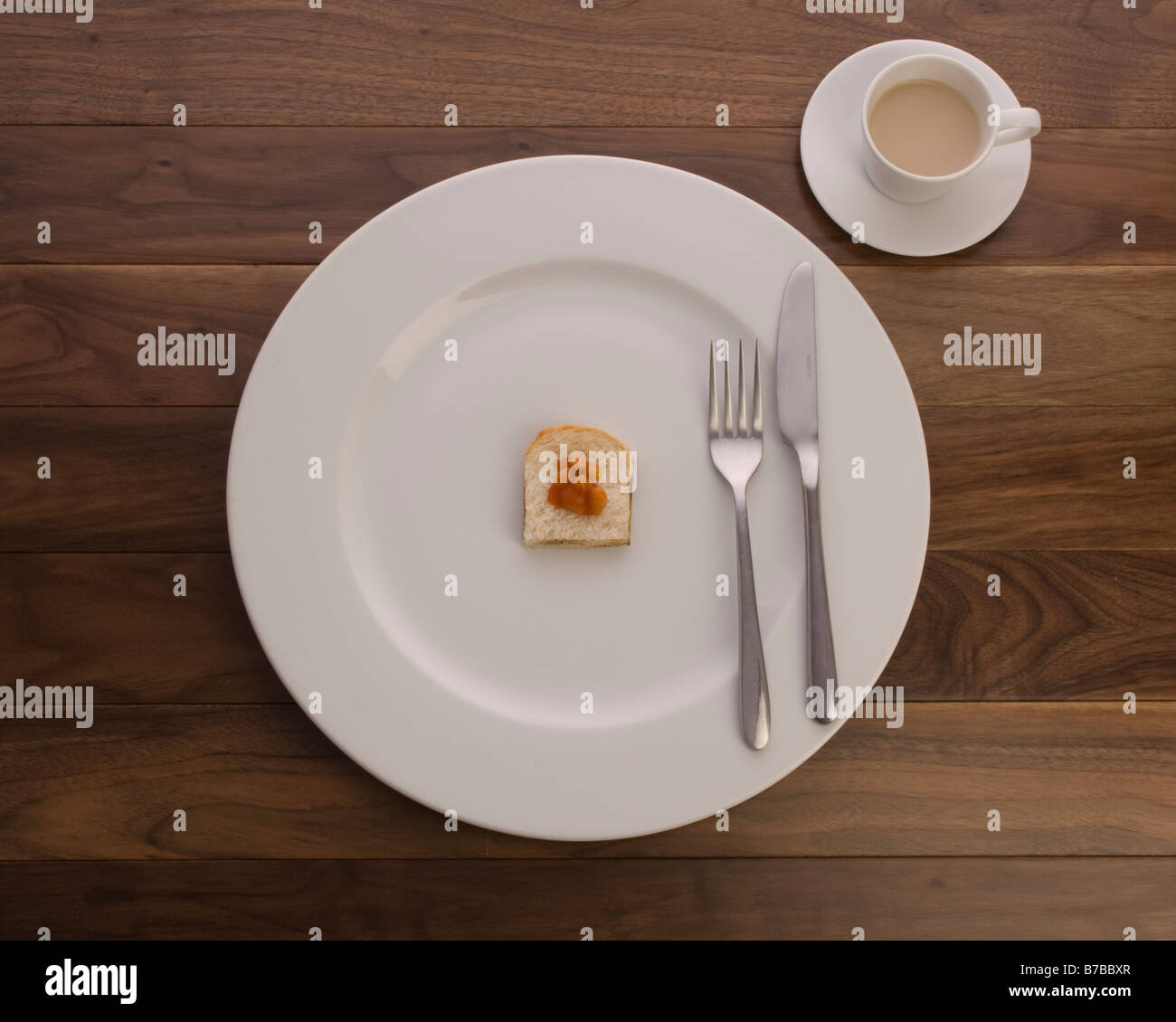 Miniature beans on toast with tea Stock Photo Alamy