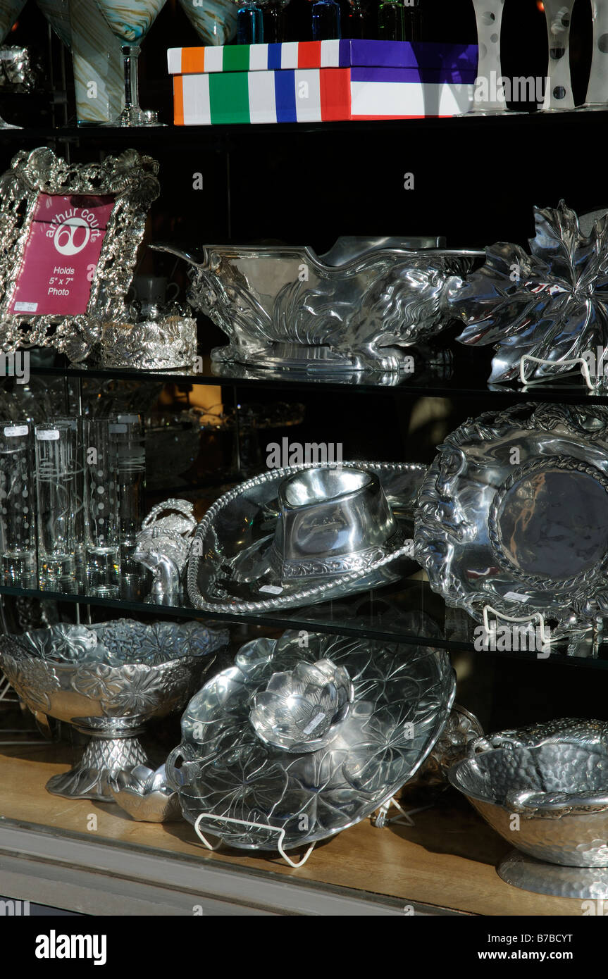 Savannah Georgia USA shop window selling silver coloured trays in various shpaes and sizes. Stock Photo