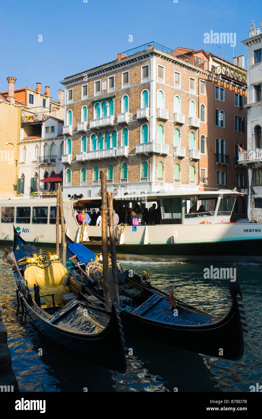 Gondolas and vaporetti boat along Grand Canal in Venice Italy Europe Stock Photo