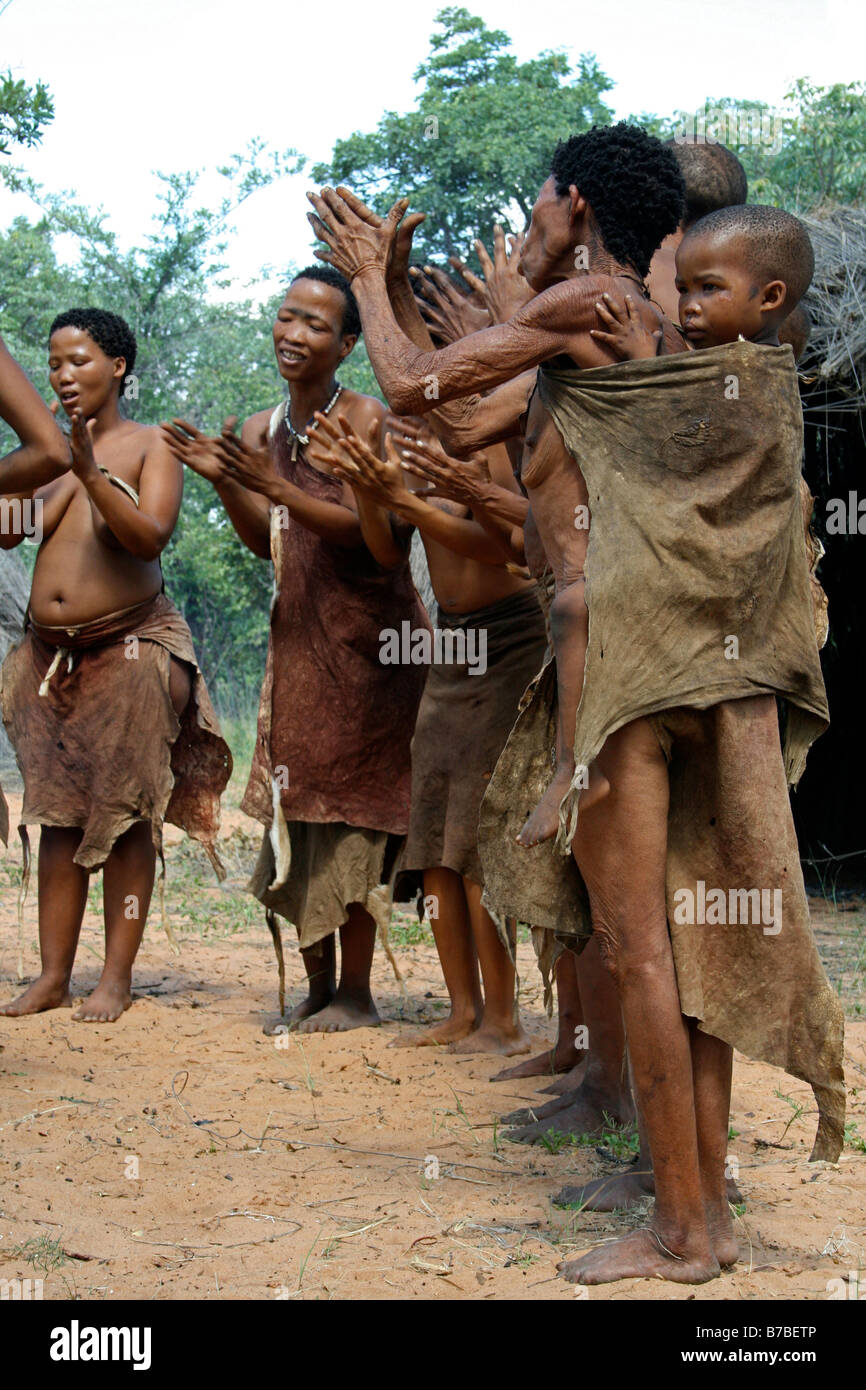 Africa, Namibia, Bushmen, San, Dancing, Clapping, Women, Child Stock Photo
