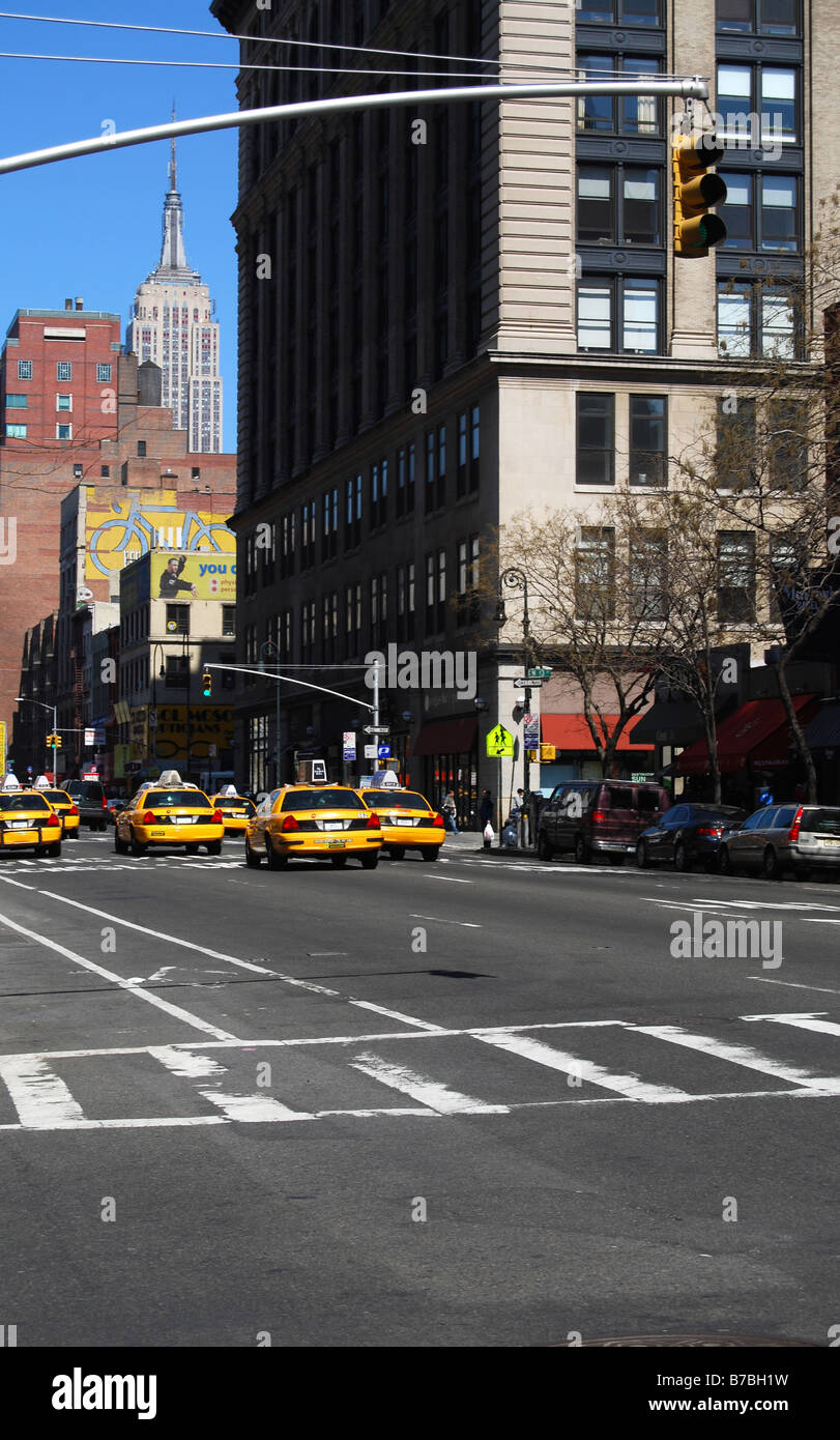 Taxis driving through Manhattan. New York City, USA Stock Photo