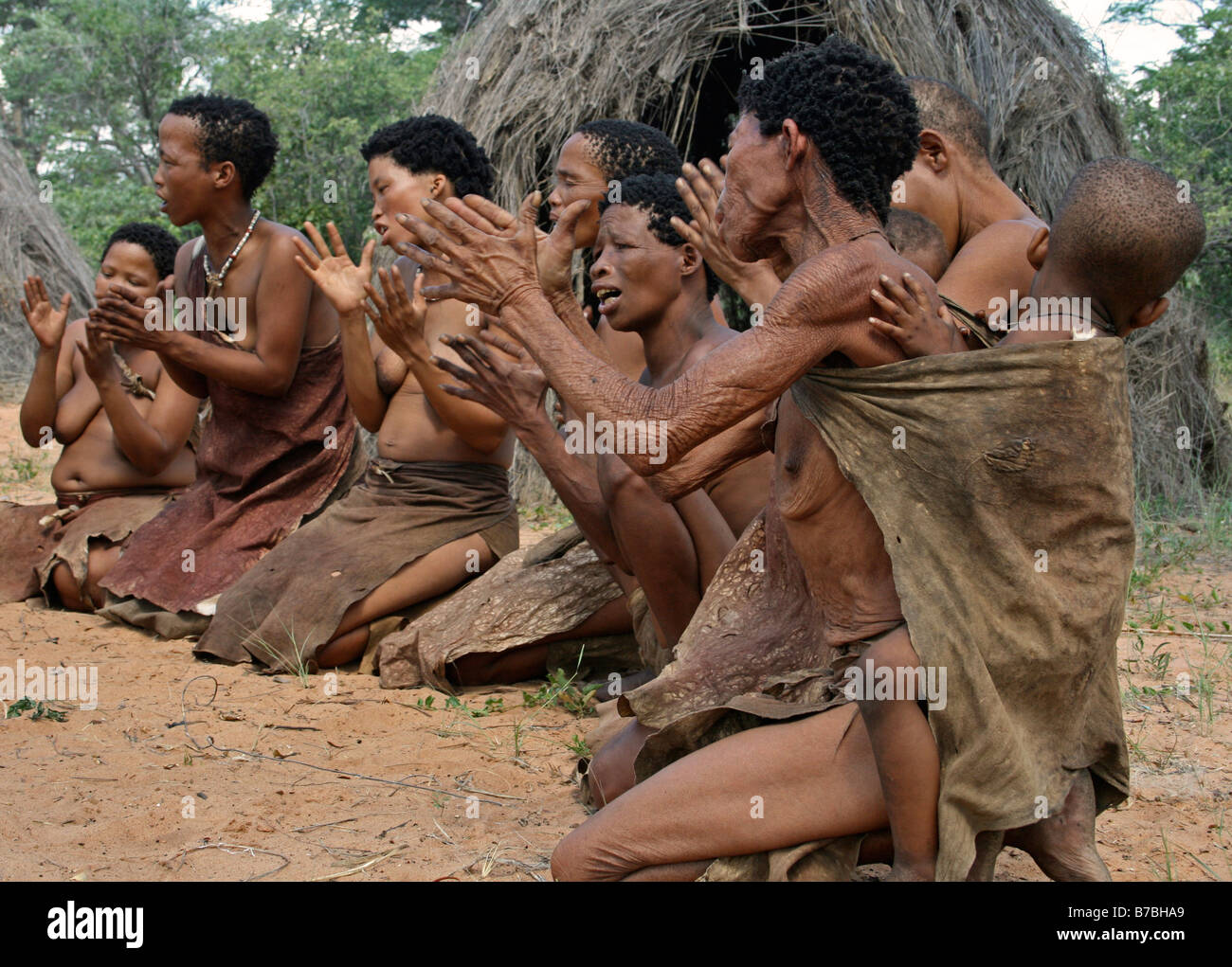 Africa, Namibia, Bushmen, San, Dancing, Clapping, Women, Child, Baby Stock Photo