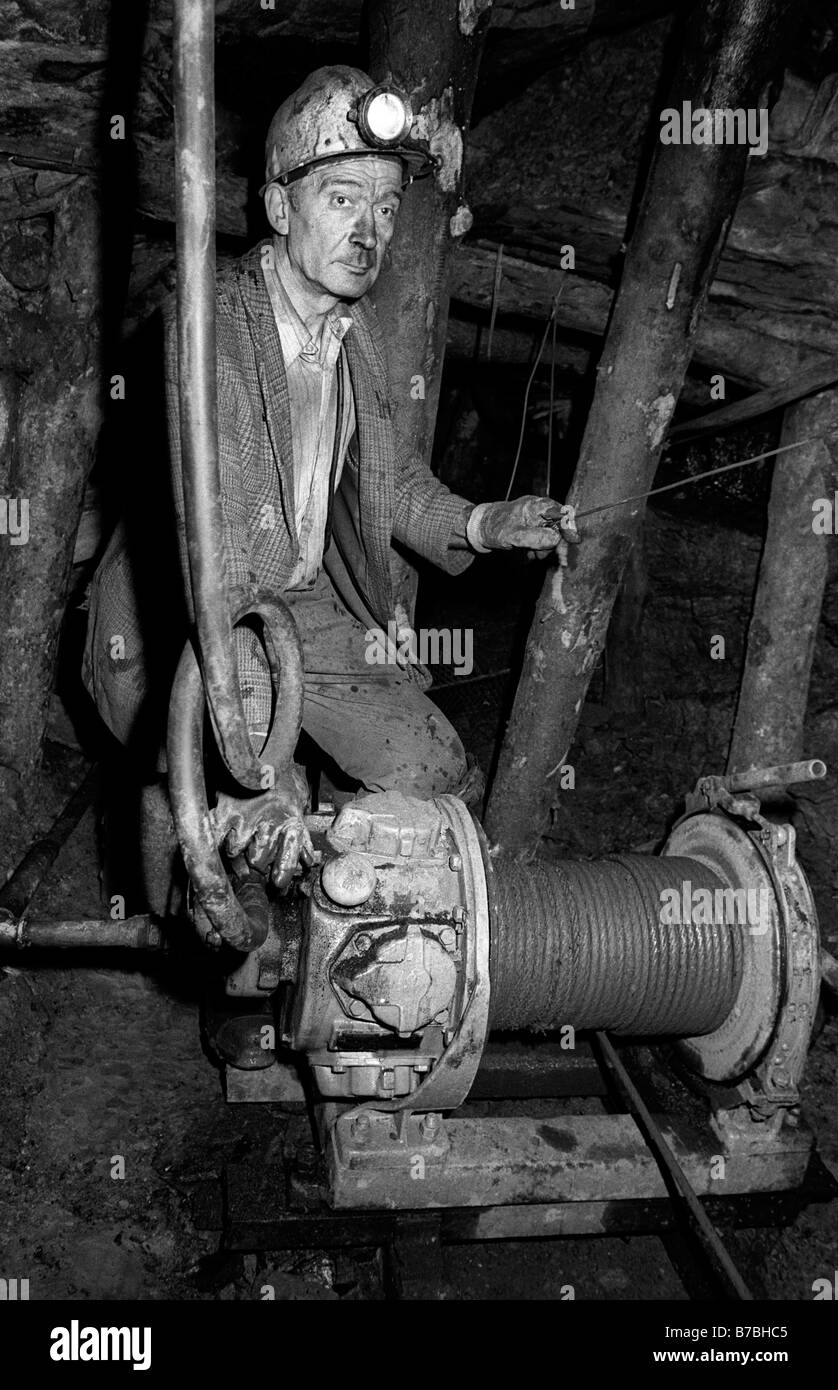 Miner using air operated haulage engine underground at Blaencuffin coal mine above Pontypool Torfaen South Wales UK Stock Photo