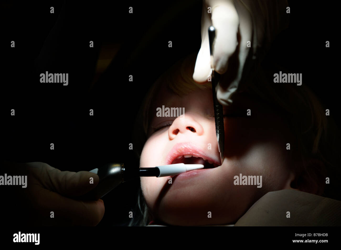 Stock photo of a 3 year old girl having her first dental check up Stock Photo