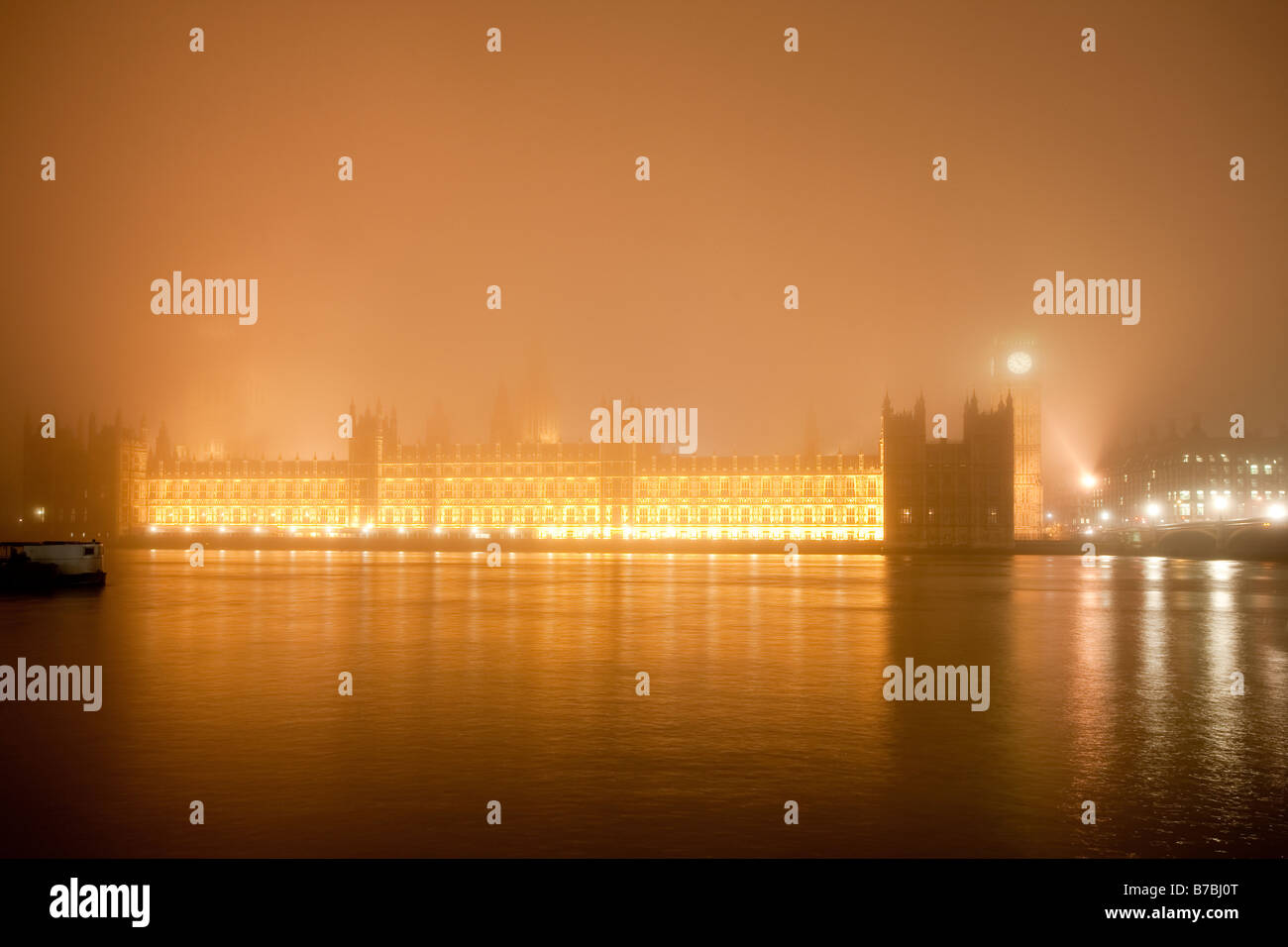 Houses of parliament on a foggy winter night. London, England, UK Stock Photo