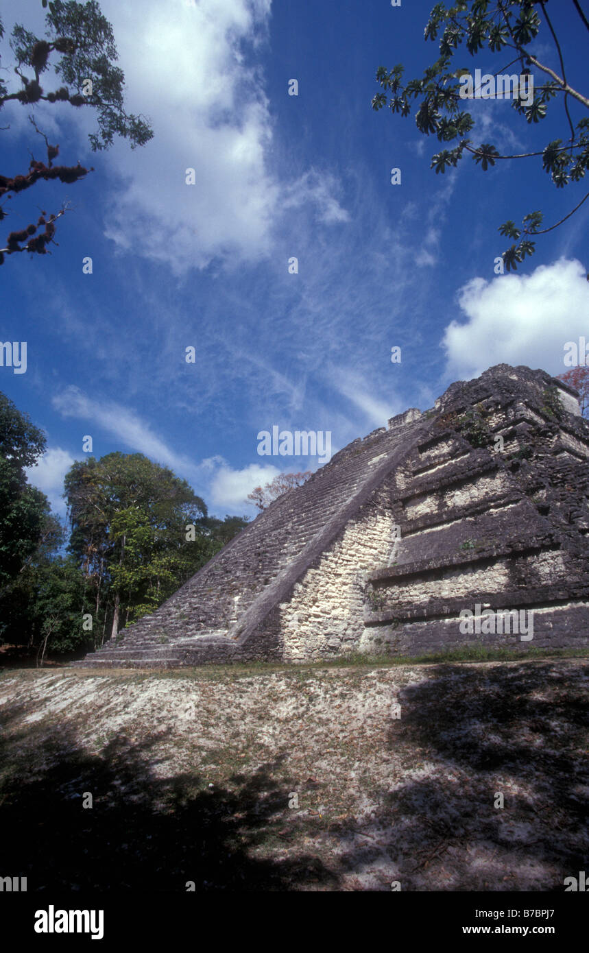 The Temple of Tablud Tablero in the Mundo Perdido or Lost World complex at the Maya ruins of Tikal, El Peten, Guatemala Stock Photo