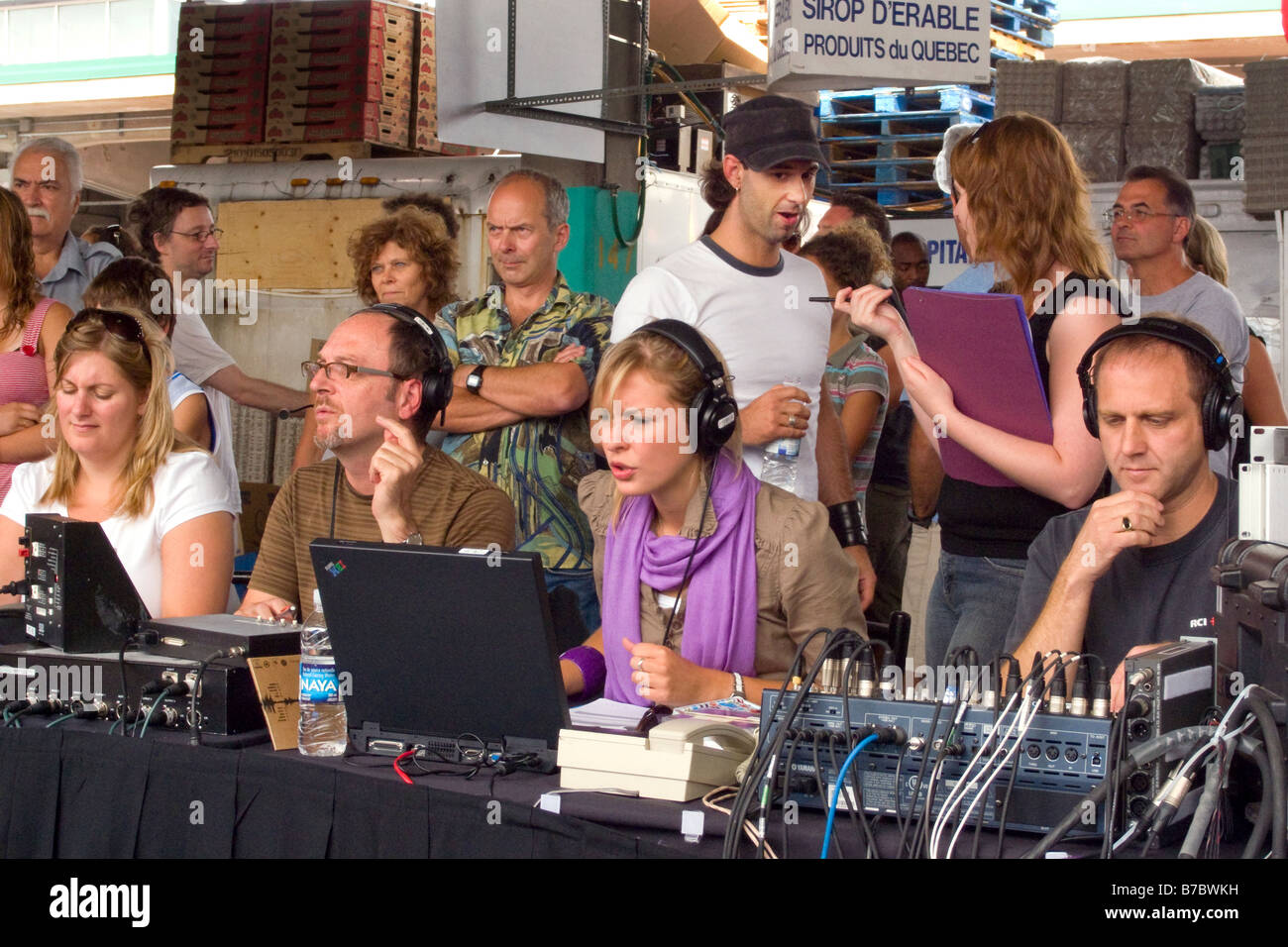 Technicians and spectators watching  an on-location radio broadcast in Montreal, Quebec Stock Photo