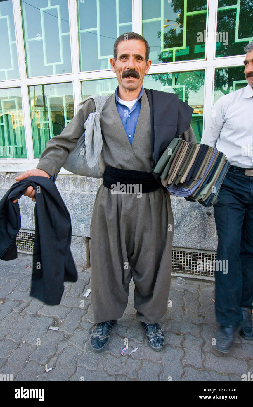 Kurdish Man Selling Kurdish Pants in Hamedan Iran Stock Photo