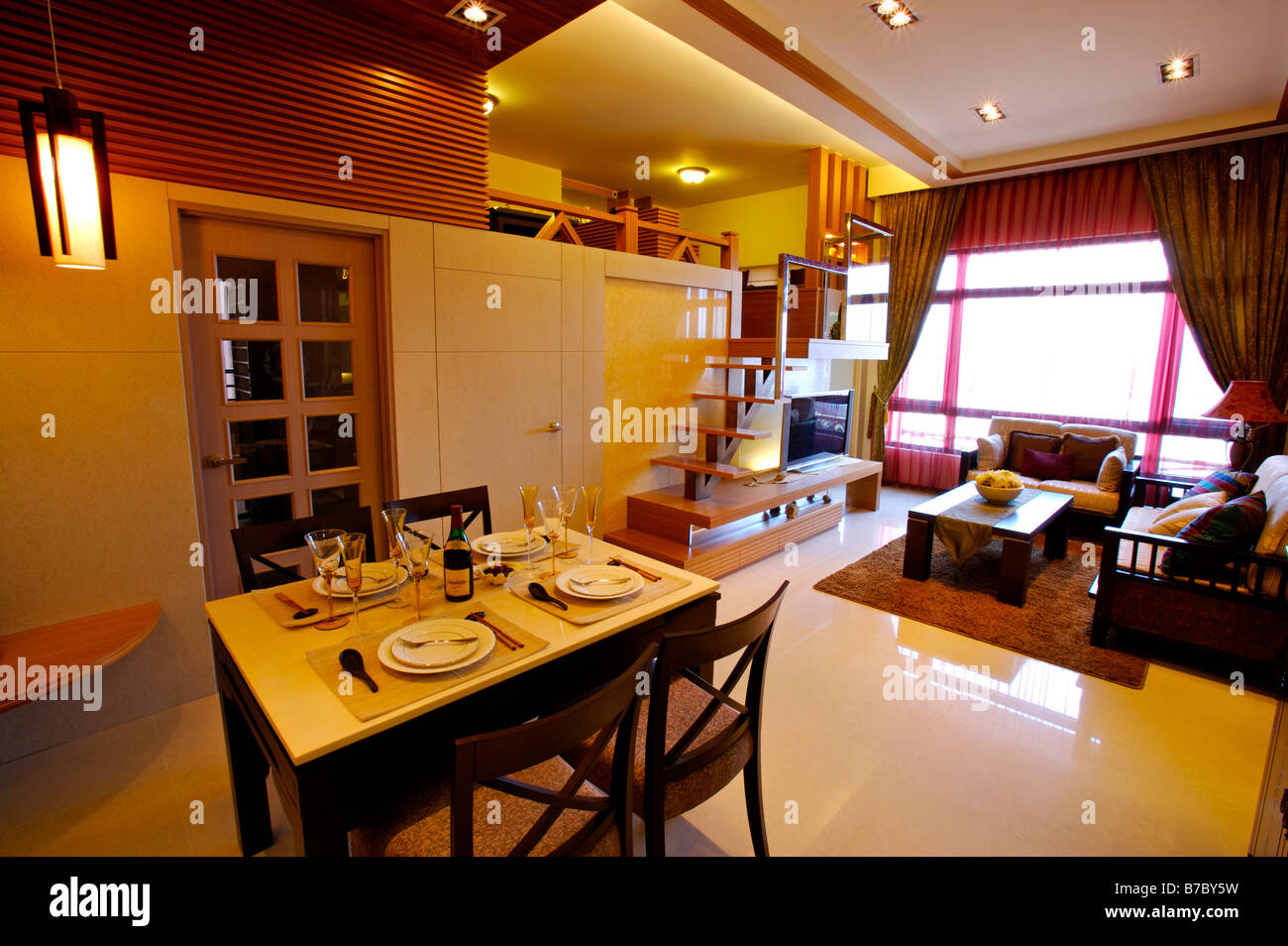 Modern dining room and living room dining table set with plates