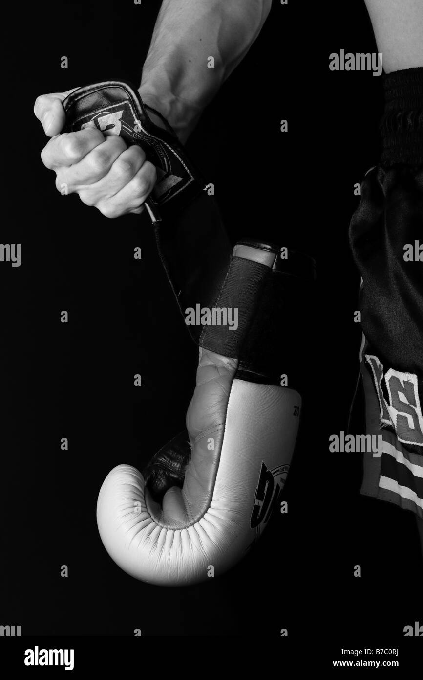 man holding boxing glove Stock Photo Alamy