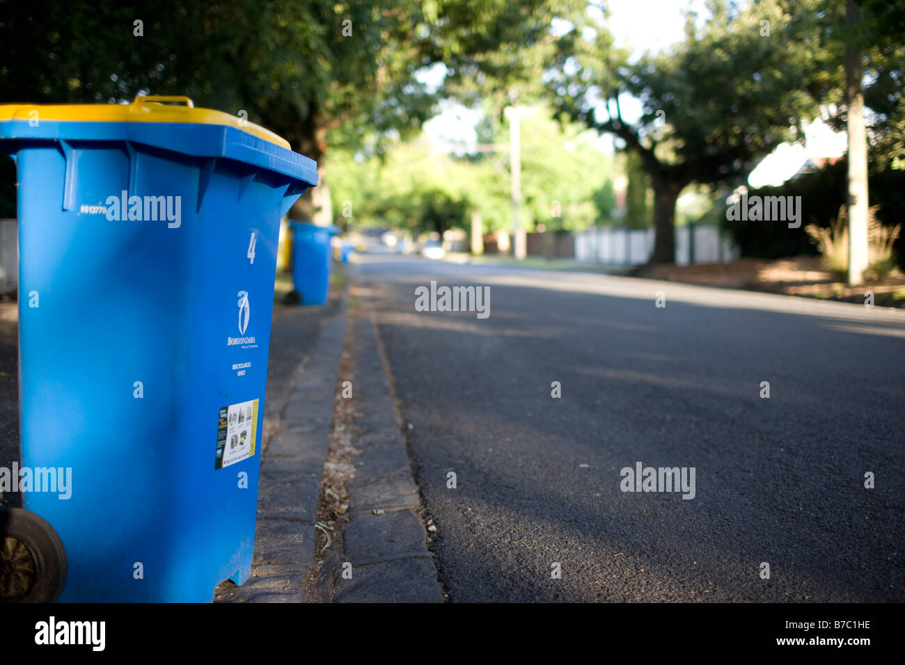 a recycling bin by the side of the road Stock Photo - Alamy