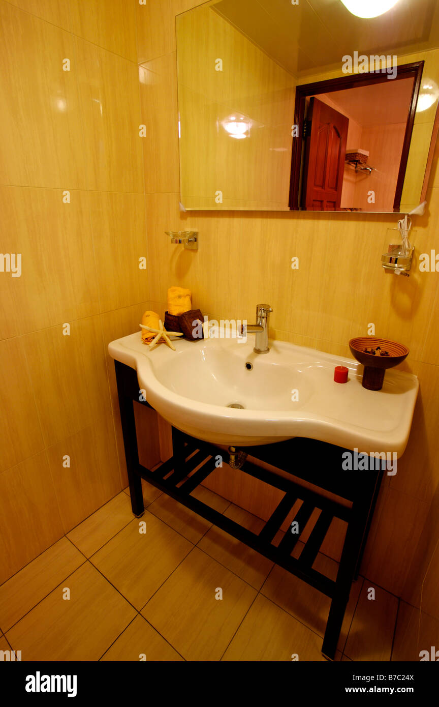 Bathroom sink with a mirror above it Stock Photo Alamy