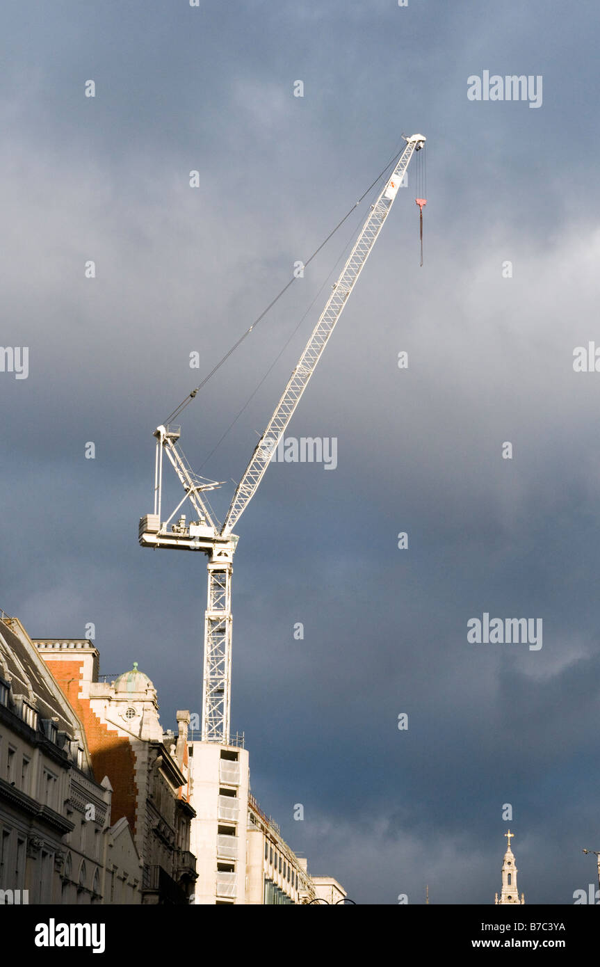 Crane against cloudy sky London England UK Stock Photo