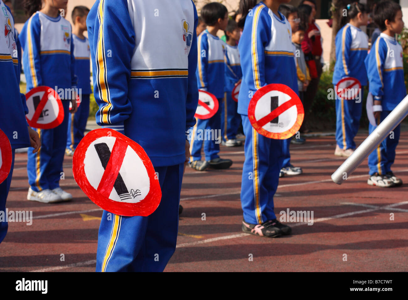 Elementary school students with 'No Smoking' signs' in Tainan, Taiwan. Stock Photo