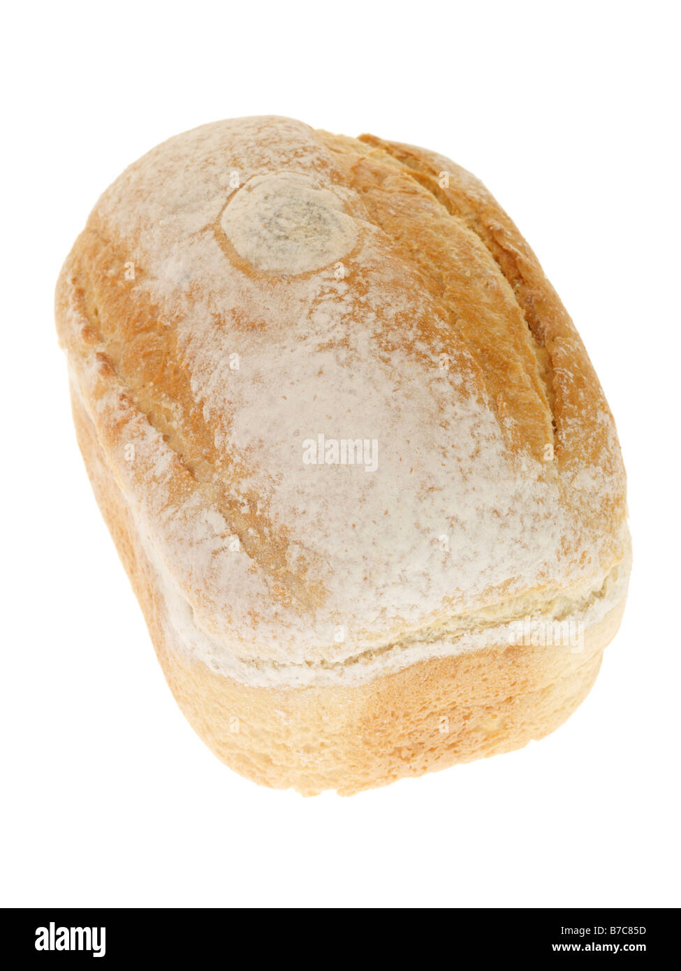 Fresh Loaf Of Baked Organic Farmhouse Bread Against A White Background With No People, Copy Space and A Clipping Path Stock Photo