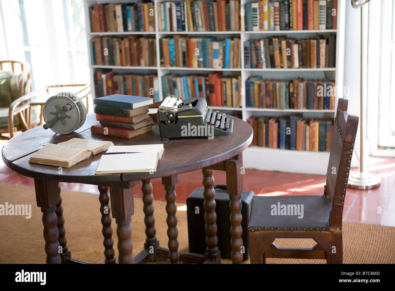 Writing studio with Royal typewriter and Cuban cigar-maker's chair at the Ernest Hemingway House in Key West, Florida. Stock Photo