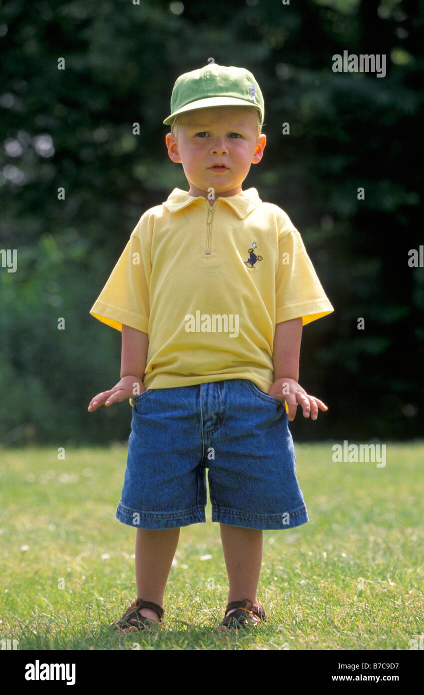 Firm standing little kid Stock Photo