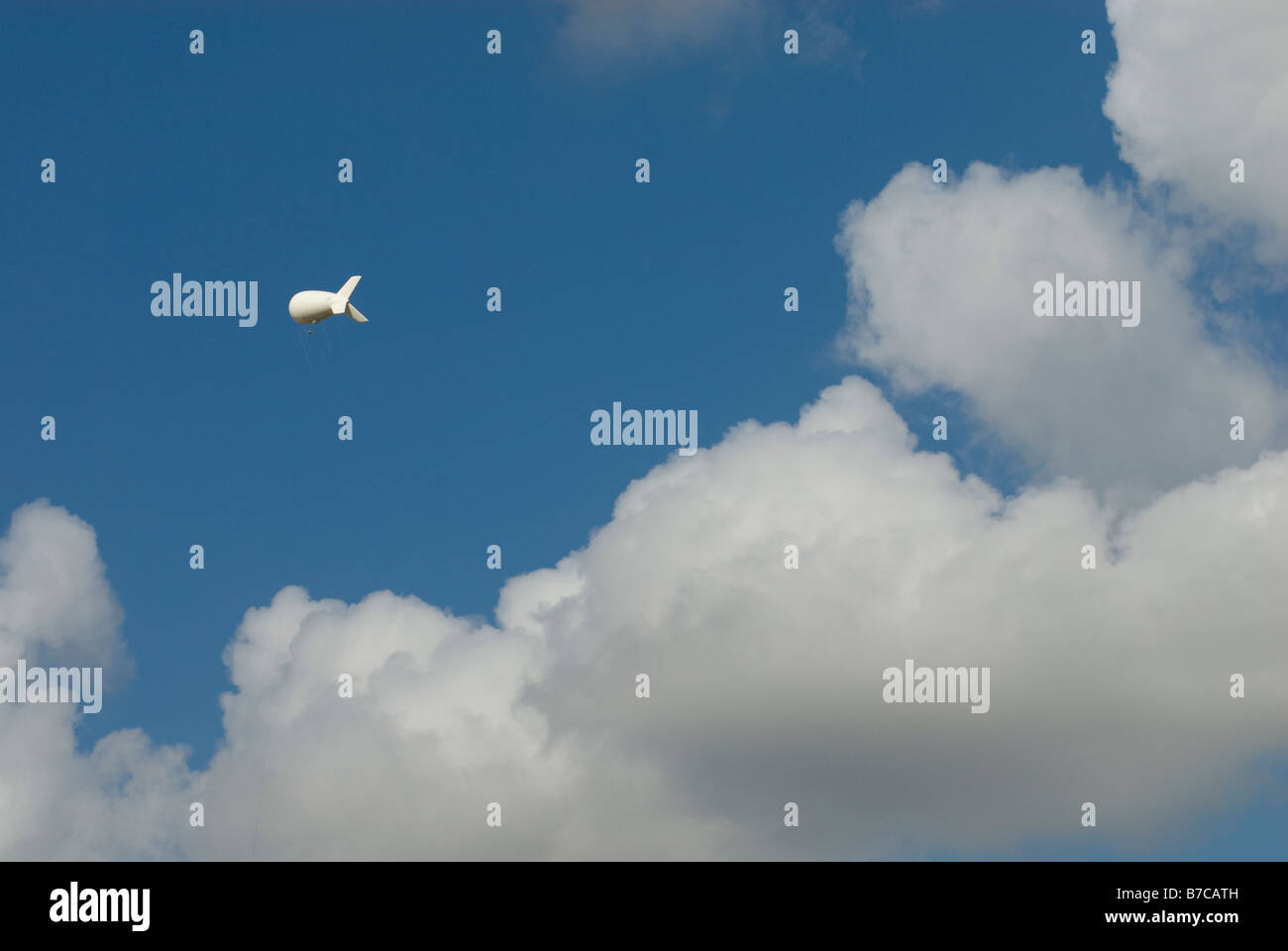 Israeli military surveillance blimp is seen in the sky on the border of