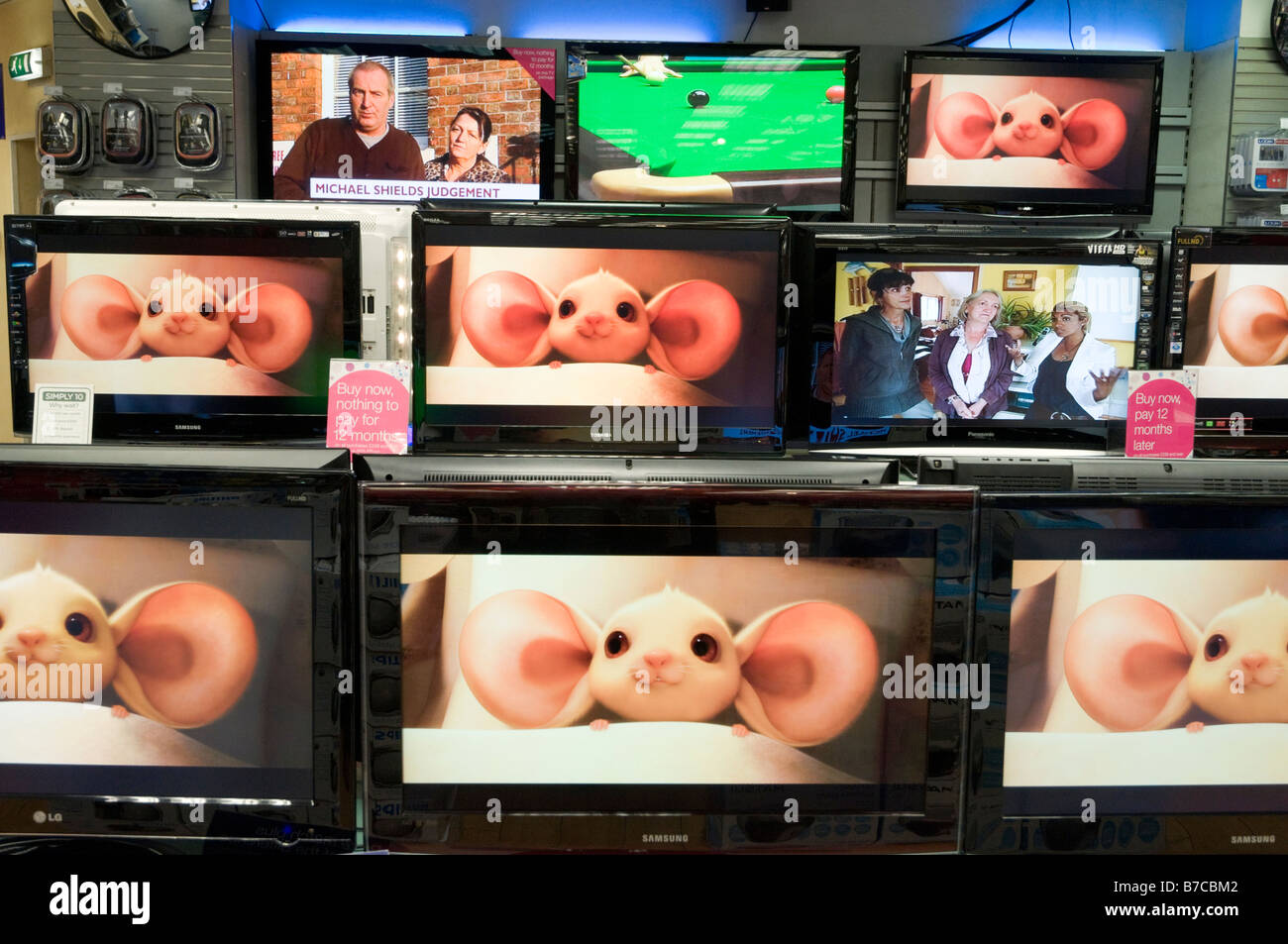 Widescreen televisions for sale in Currys Digital, England, UK Stock Photo