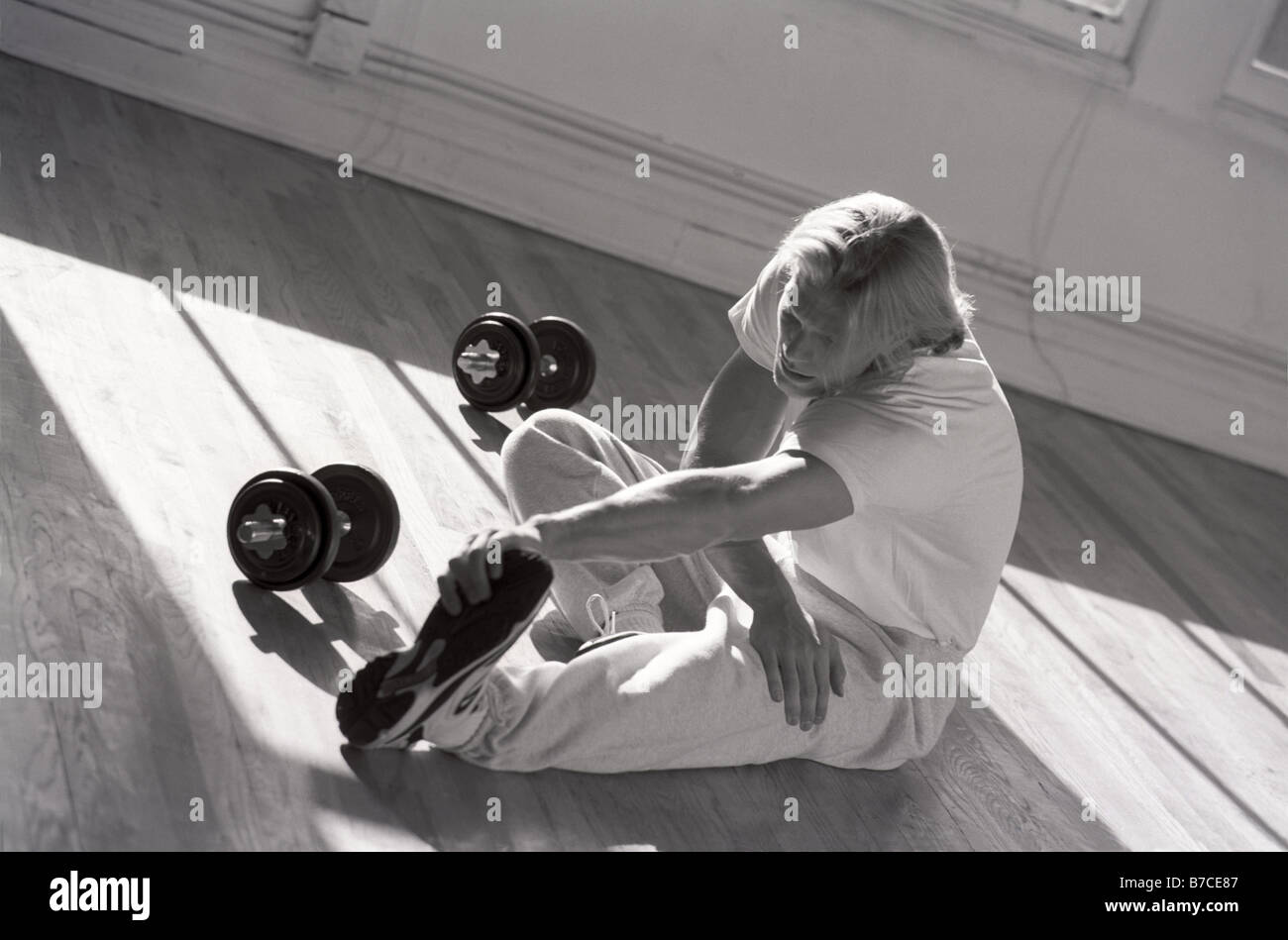 Stretching exercises man hi-res stock photography and images - Alamy