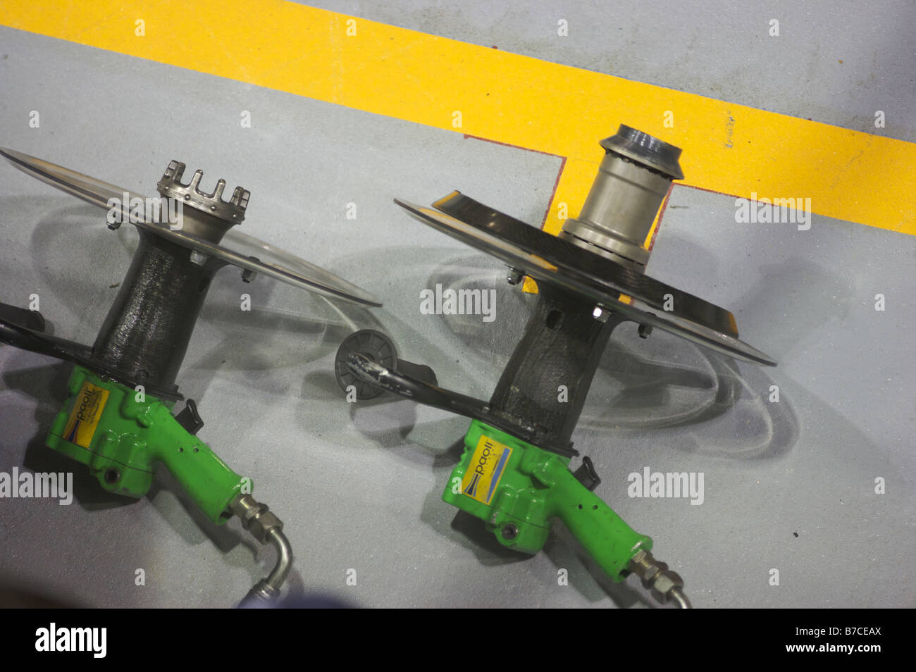 F1 Formula 1 pneumatic wheel release guns Stock Photo