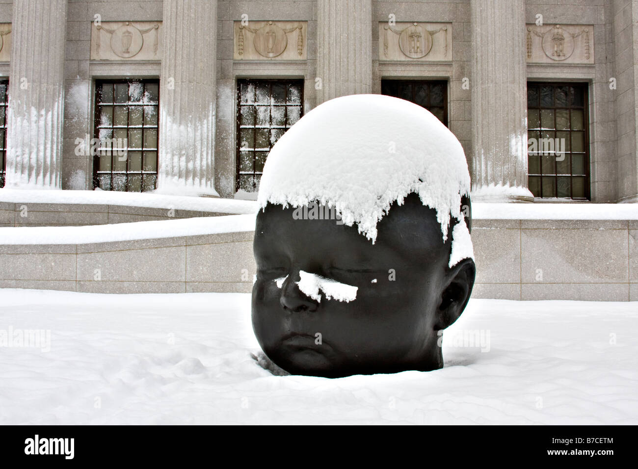 Sculpture called "Night" by Antonio Lopez Garcia covered in snow