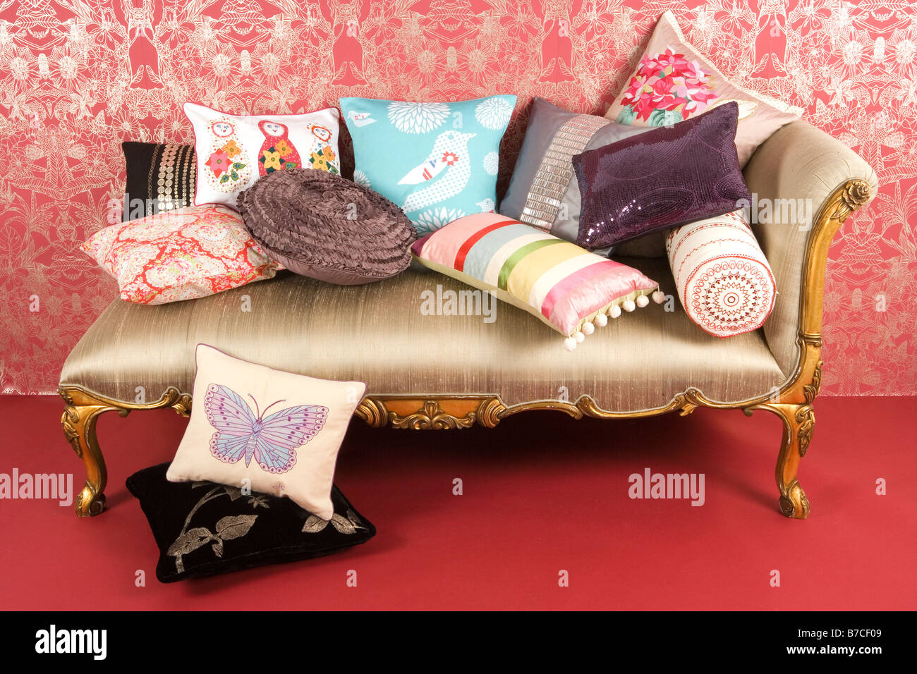 A collection of cushions on a Chaise Longue Stock Photo